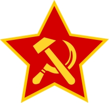 Grafik: Altes Logo der KPD: Roter Stern, gelb umrandet, darin überkreuzen sich ein gelber Hammer und eine gelbe Sichel.