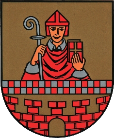 Foto: Altes Stadtwappen von Lüdenscheid: Eine Figur (sie soll den Heiligen St. Medardus darstellen), darunter ein zweireihiges rot-graues Schachbrettmuster, darunter eine stilisierte Stadtmauermit einem Tor.